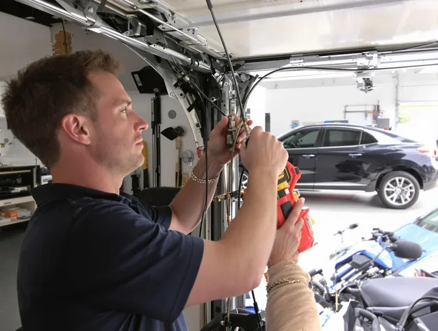 Winthrop Garage Door Repair safety certified technician performing cable replacement in Winthrop