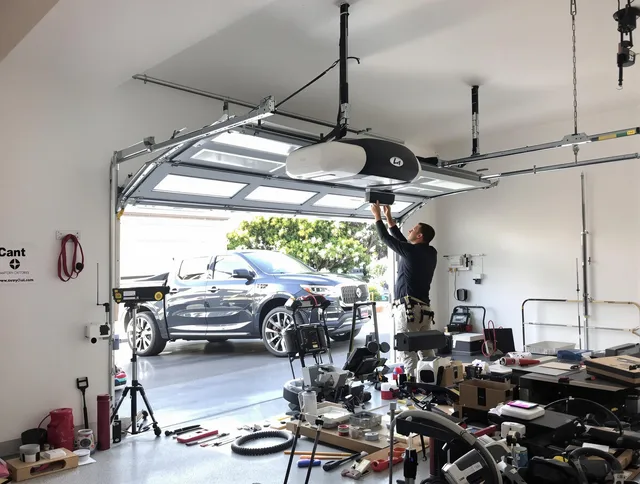 Winthrop Garage Door Repair specialist installing smart garage door opener system in Winthrop home