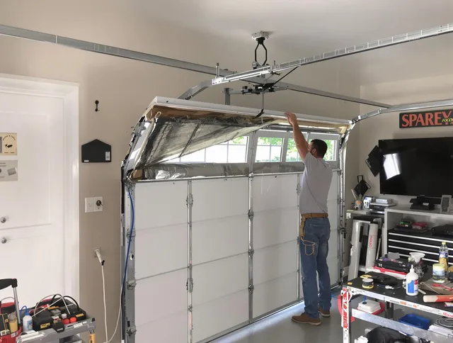 Garage door section replacement by Winthrop Garage Door Repair in Winthrop