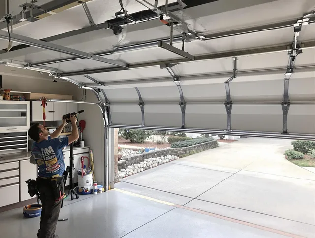 Garage door track repair service by Winthrop Garage Door Repair in Winthrop